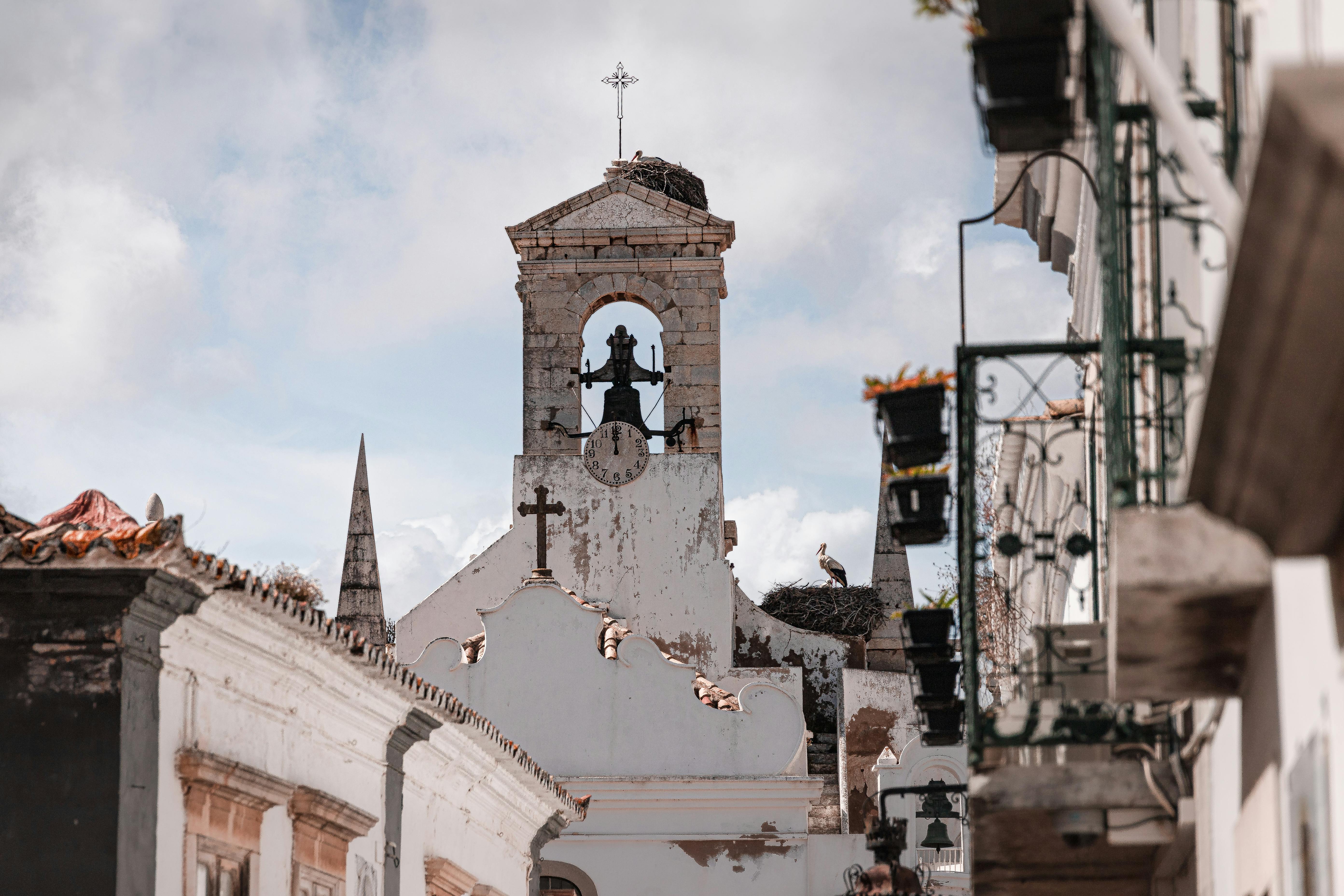 A traditional bell tower in Faro, Portugal, capturing architectural charm and cultural essence.