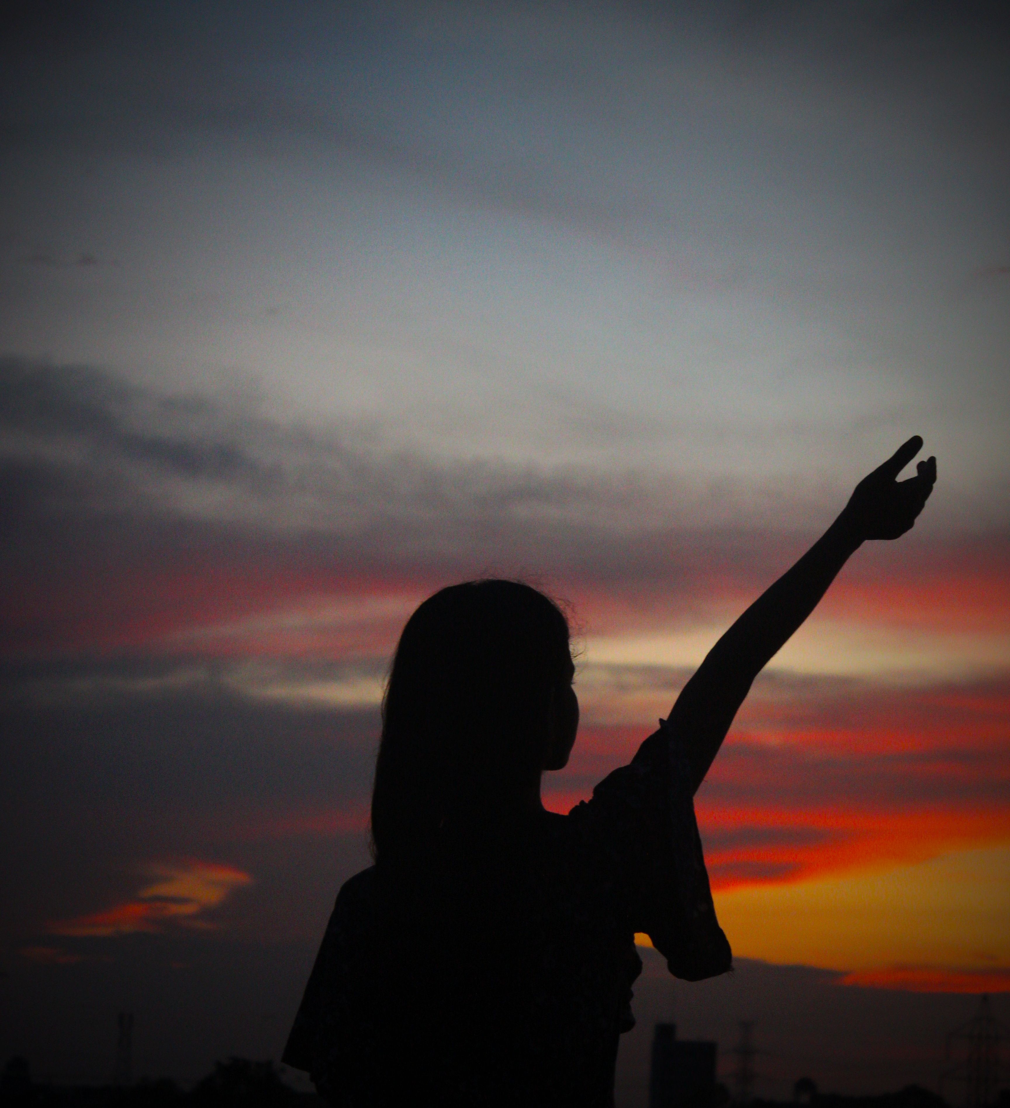 A Woman Standing Under The Starry Sky Free Stock Photo
