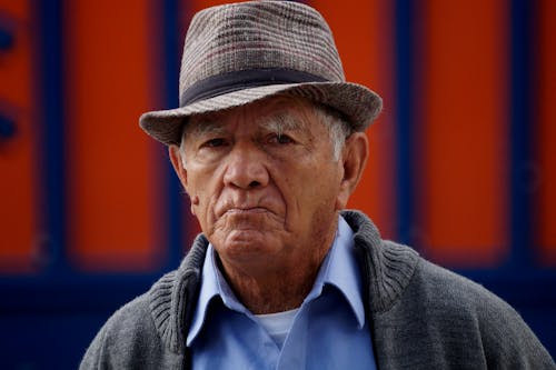 Elderly Man Wearing Fedora Hat 