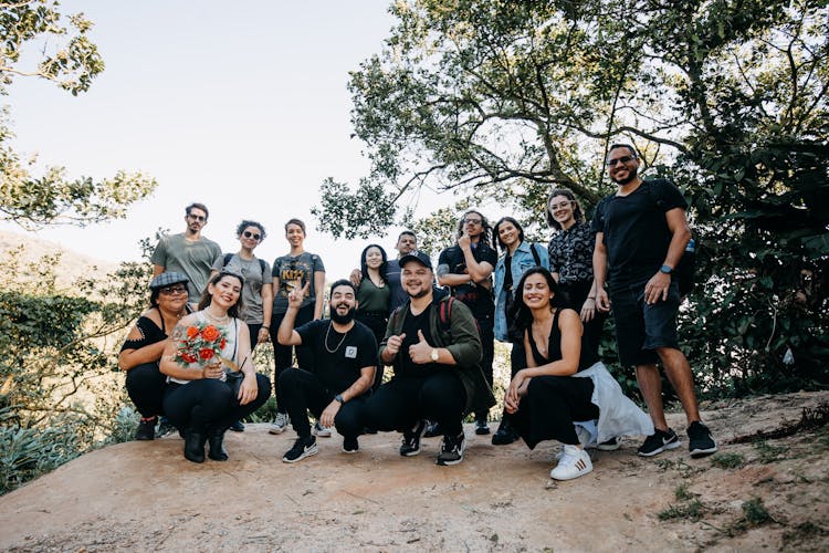 Group Of People Posing On A Trip