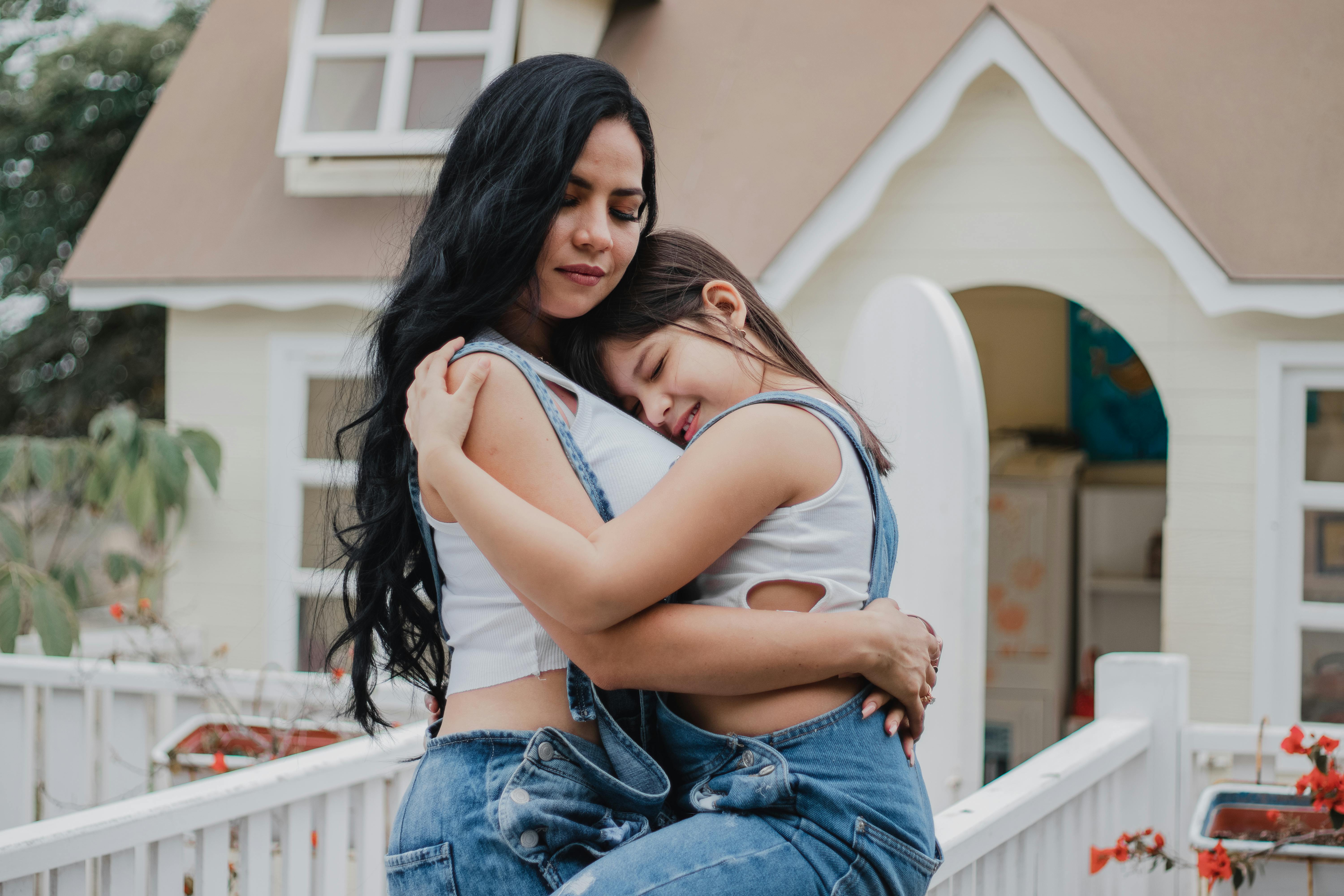 mother and daughter hugging