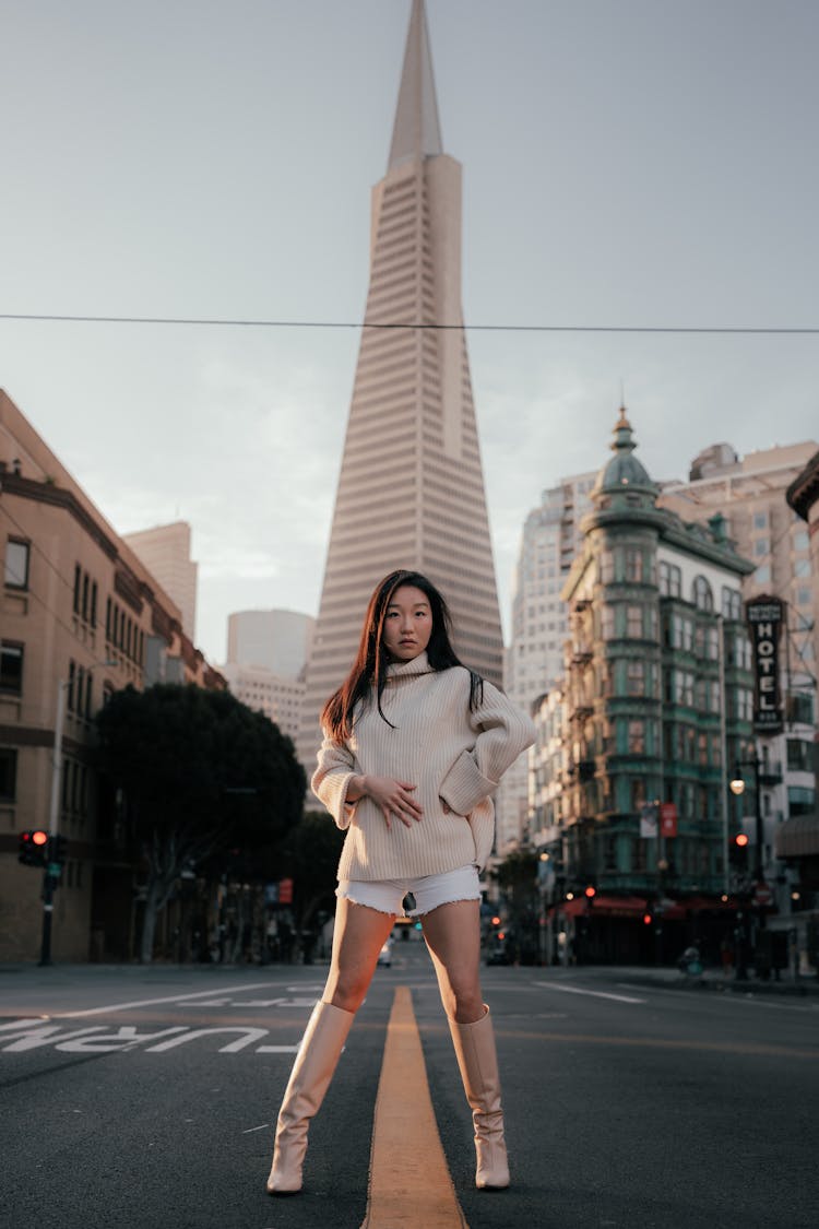 Woman Posing On A Street In Front Of The Transamerica Pyramid