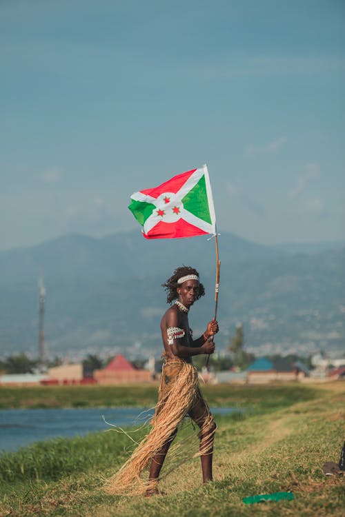 African Tribal Man with a Burundi Flag