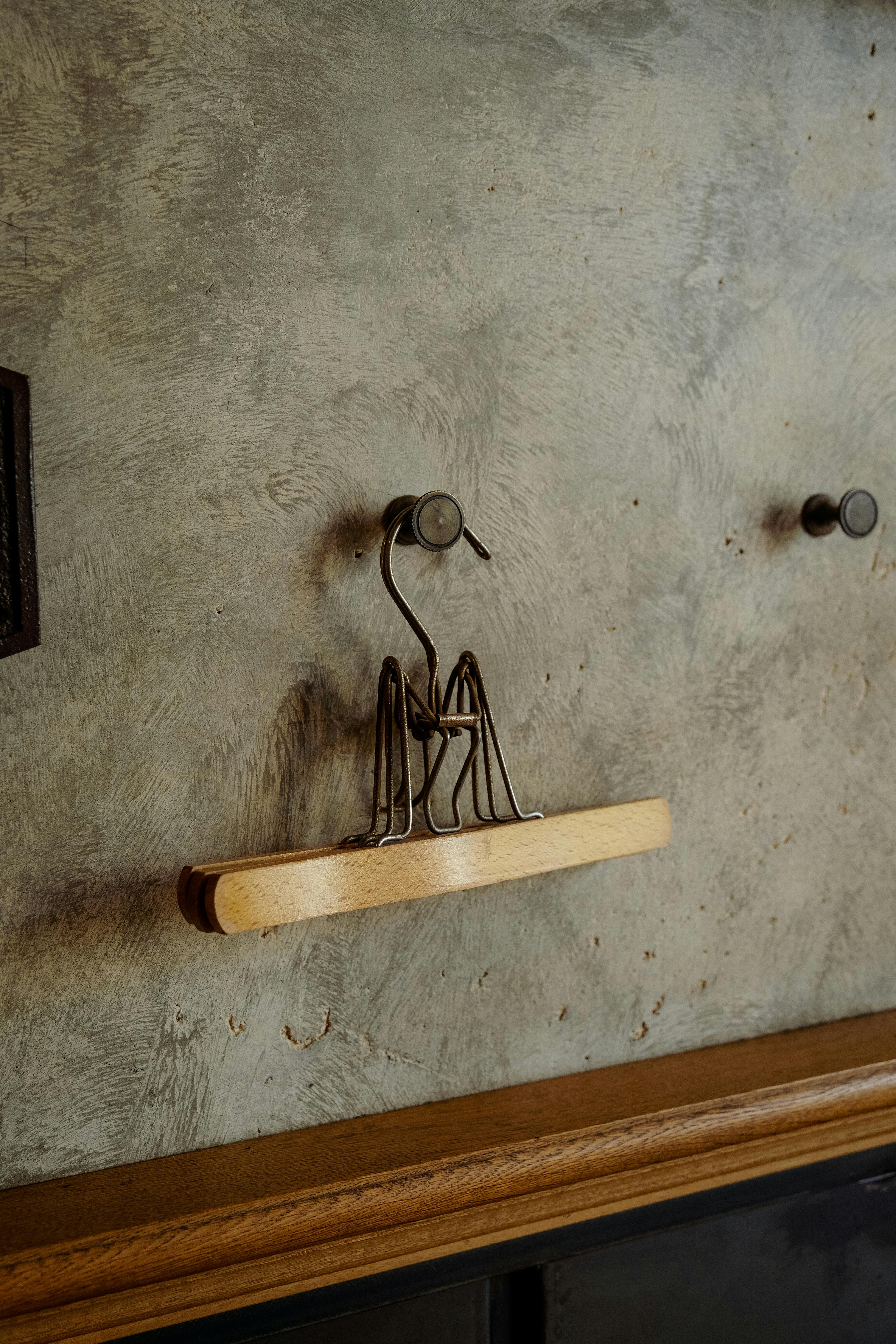 Clothes Hanger on the Wall · Free Stock Photo