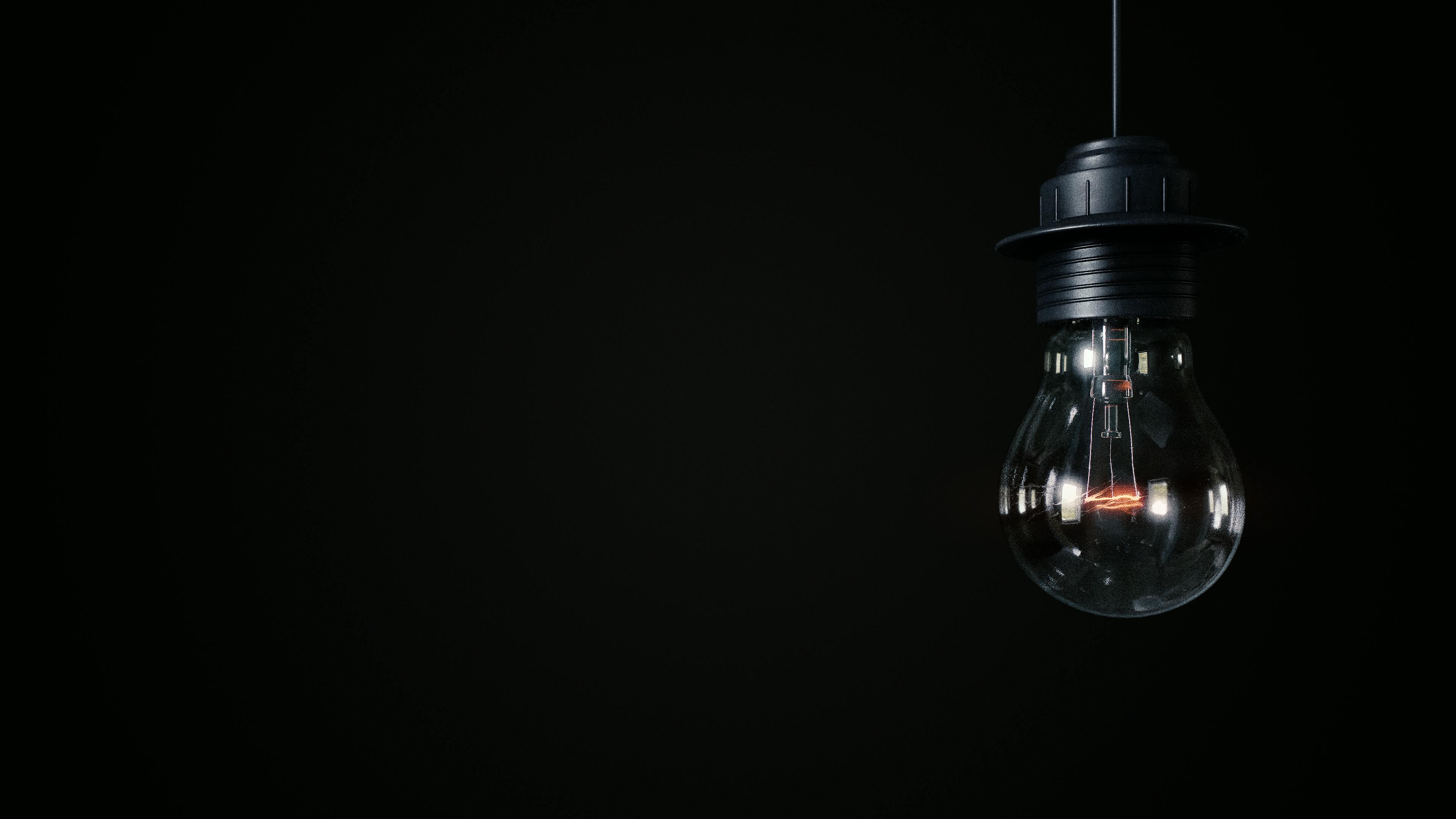 Light Bulb with Black Background · Free Stock Photo