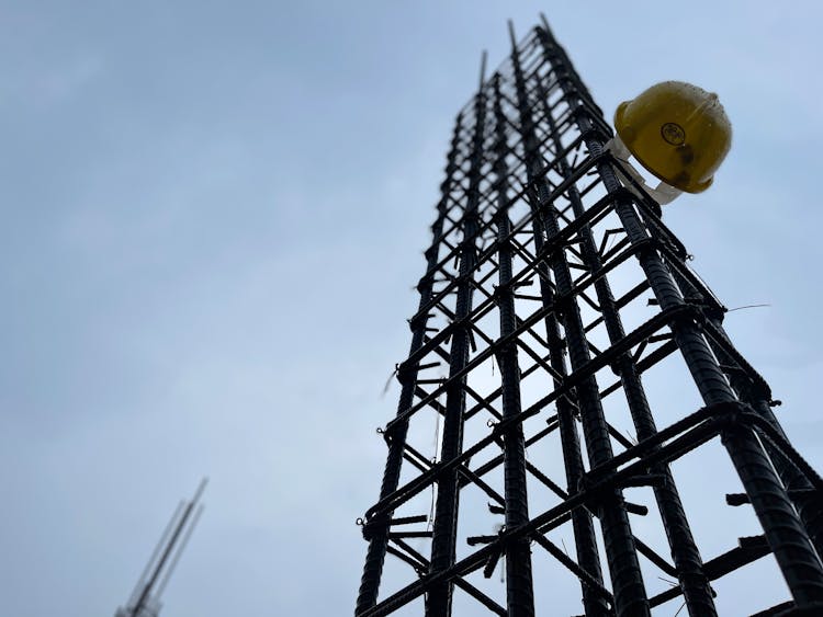 Safety Helmet Hanging On Metal Reinforcement