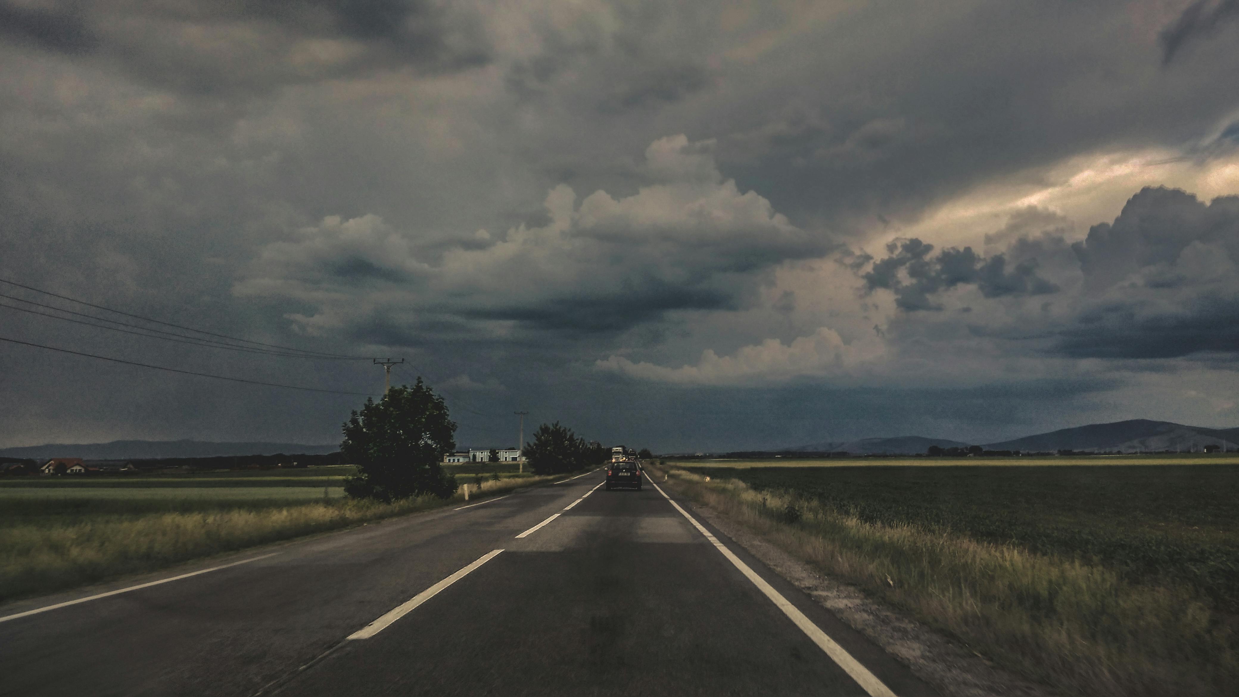 Free stock photo of clouds, driving, road