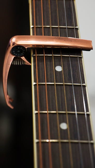 Choosing the Right Capo for Your Acoustic Guitar Needs