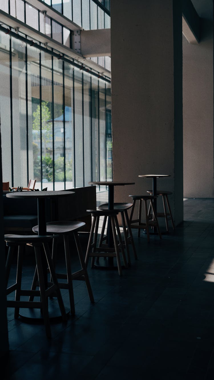 Tables And Chairs At Restaurant