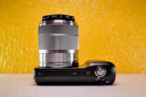 Free Camera with Lens on Table Stock Photo