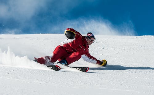 Free Man on Ski Board on Snow Field Stock Photo