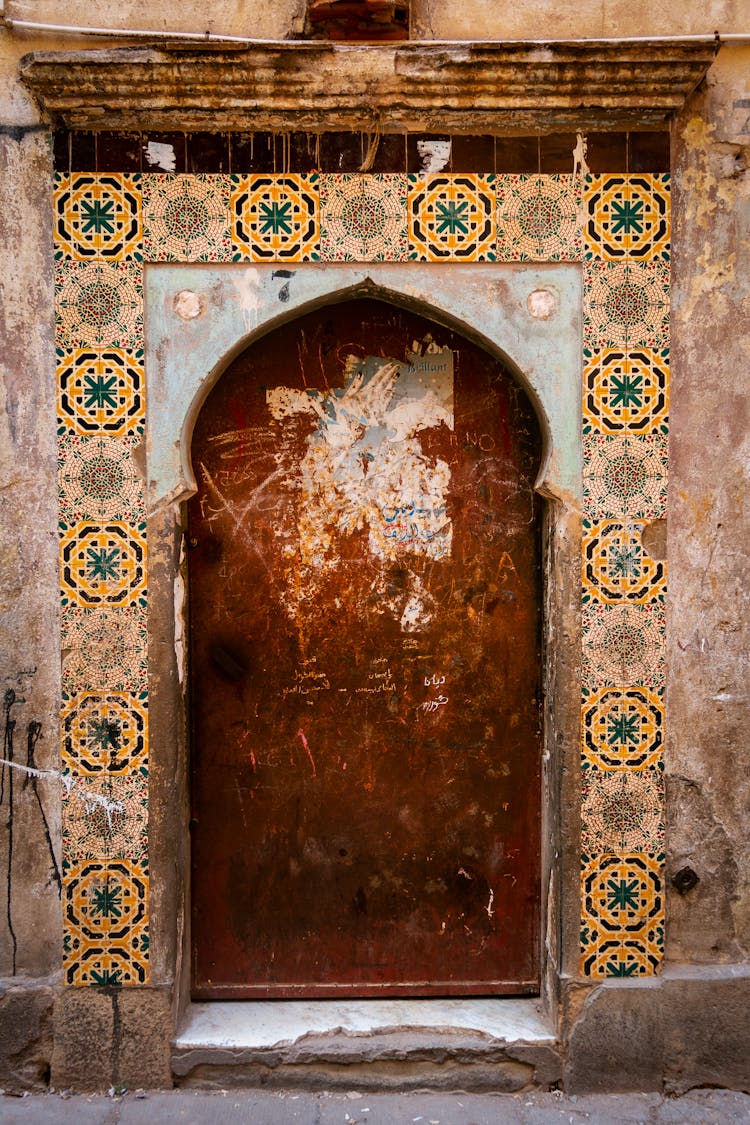 Closed Steel Door On Concrete Wall