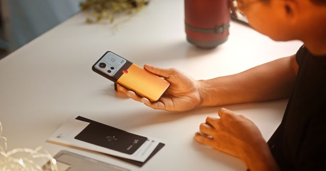 A Man Holding a Cellphone