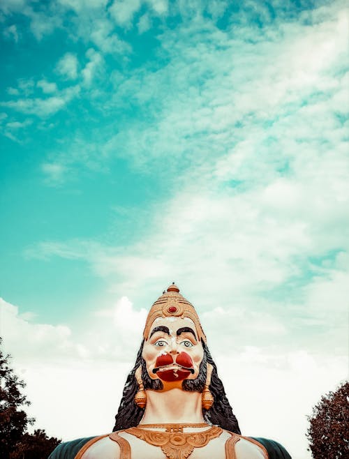 Low Angle Shot of the Hanuman God Statue under Blue Sky