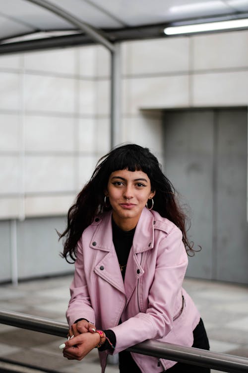 A Woman Leaning on the Railings