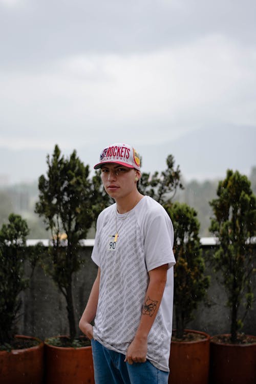 Man in Baseball Cap and T-Shirt 