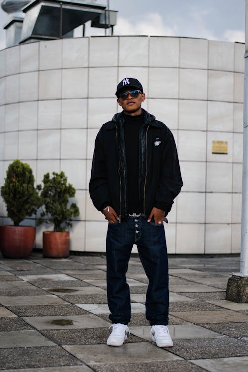 Fashionable Young Man in Black Jacket