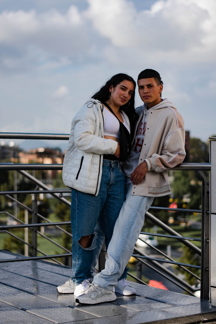 Young Couple Hugging Outdoors 