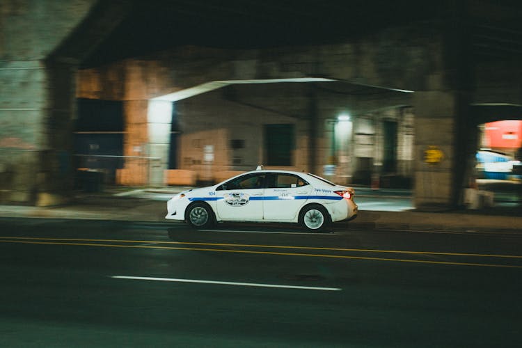 White Car Travelling On The Road