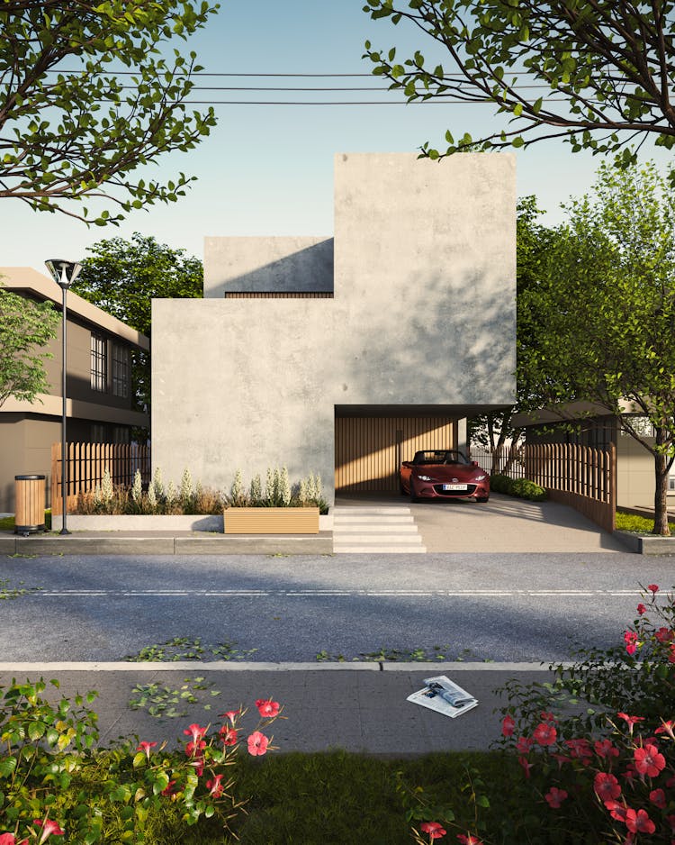 A Concrete House With Parked Car In Garage