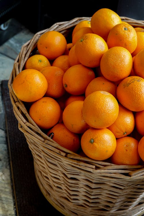 Orange Fruits in Brown Woven Basket