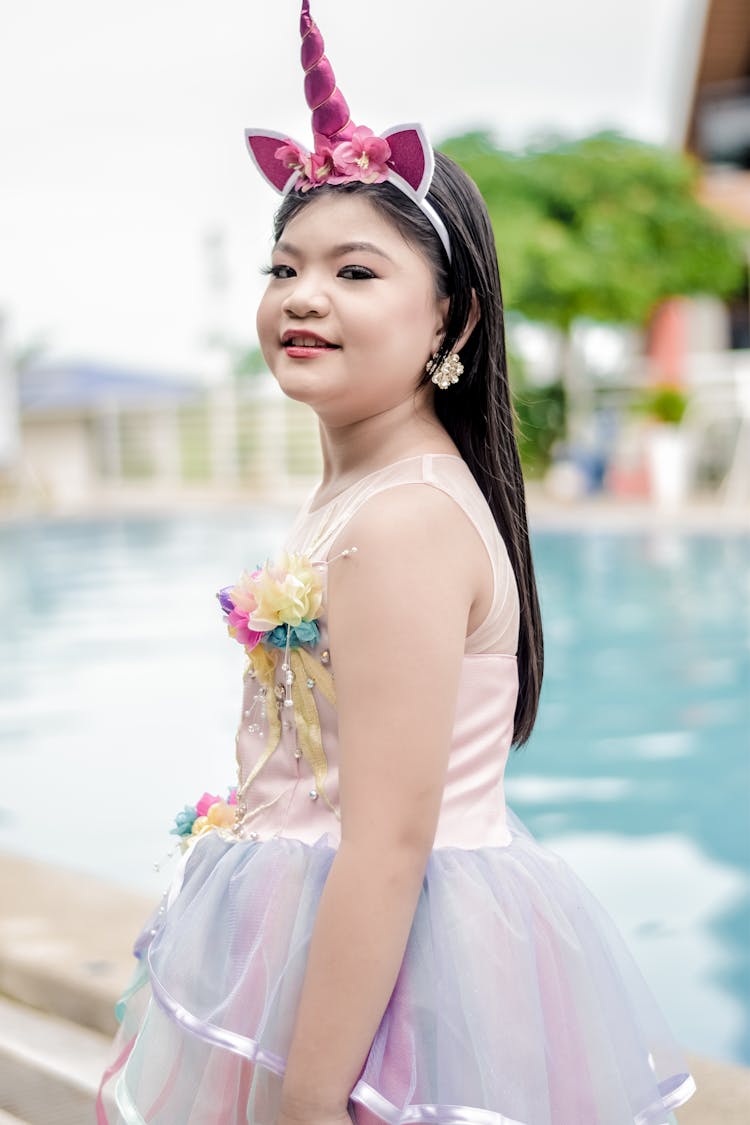 Close-Up Shot Of A Girl In Unicorn Costume