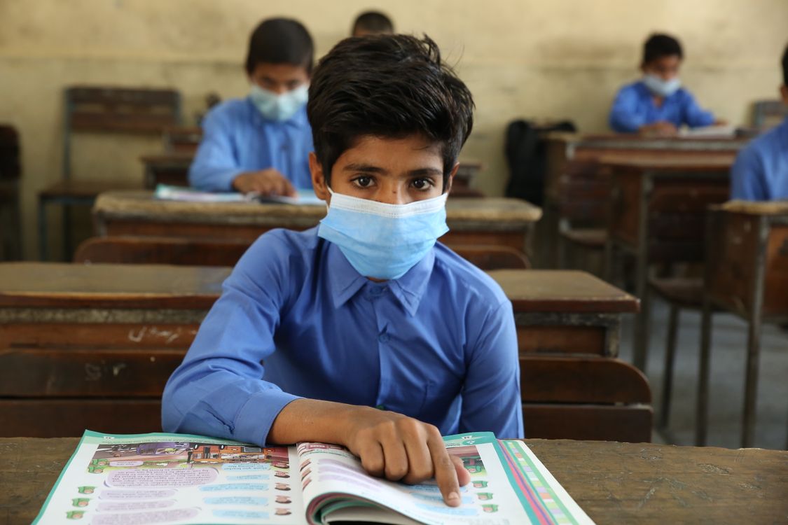Boy Wearing a Face Mask at School · Free Stock Photo