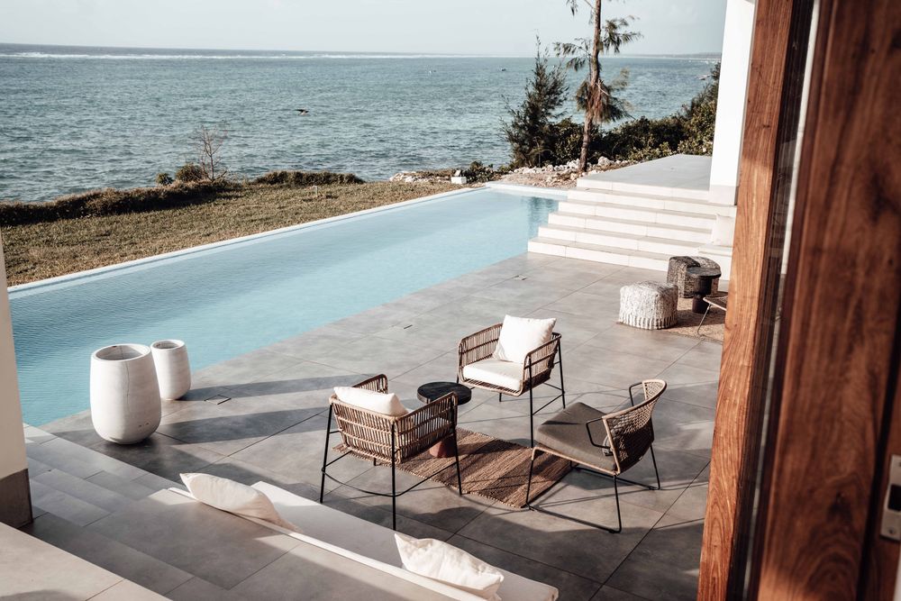 Seaside terrace with a pool overlooking the ocean — photo by Keegan Checks on Pexels