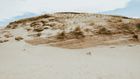 Last saved item: low sand dunes — photo by Artūras Kokorevas on Pexels