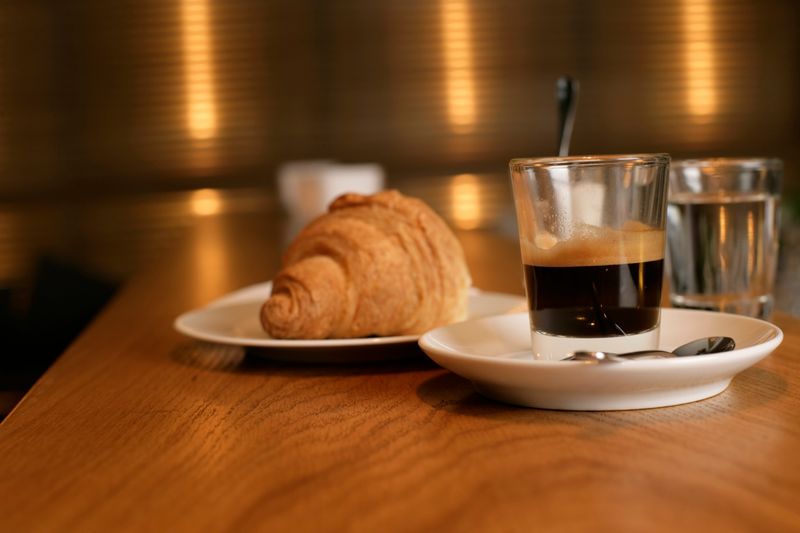 Breakfast pastry and espresso