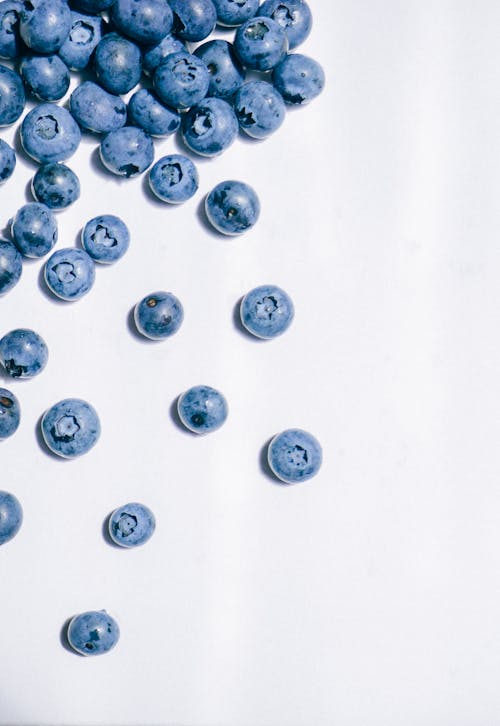 Fresh Blueberries on White Surface