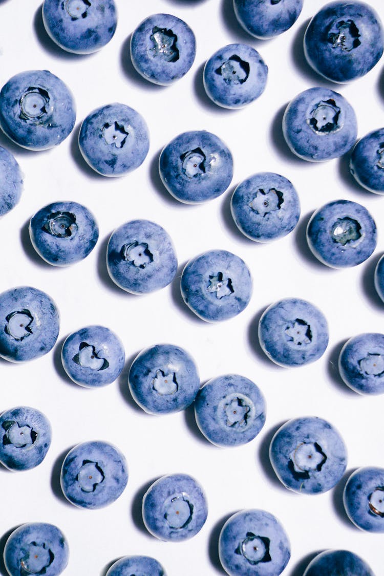 Blueberries On White Surface