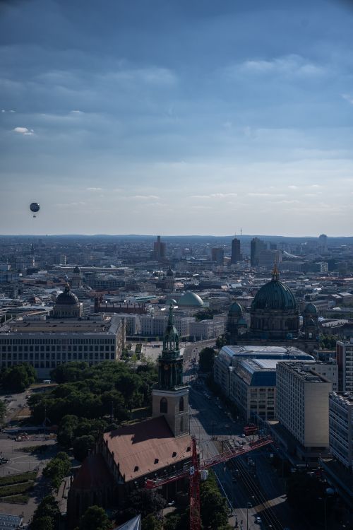Free A stunning aerial view of Berlin showcasing iconic landmarks including the Berliner Dom under a clear sky. Stock Photo