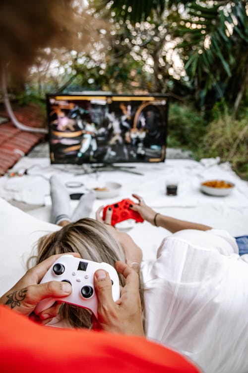 A Couple Playing on a Game Console Together