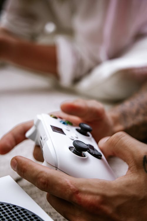 A Person Holding a Game Controller