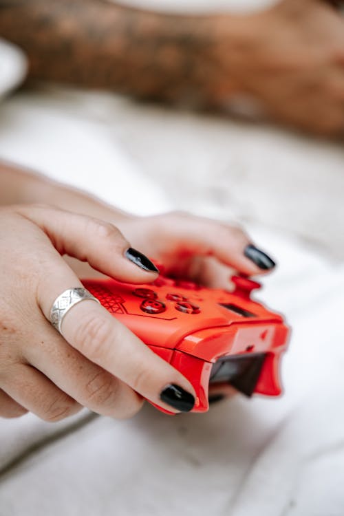 A Person Holding a Game Controller