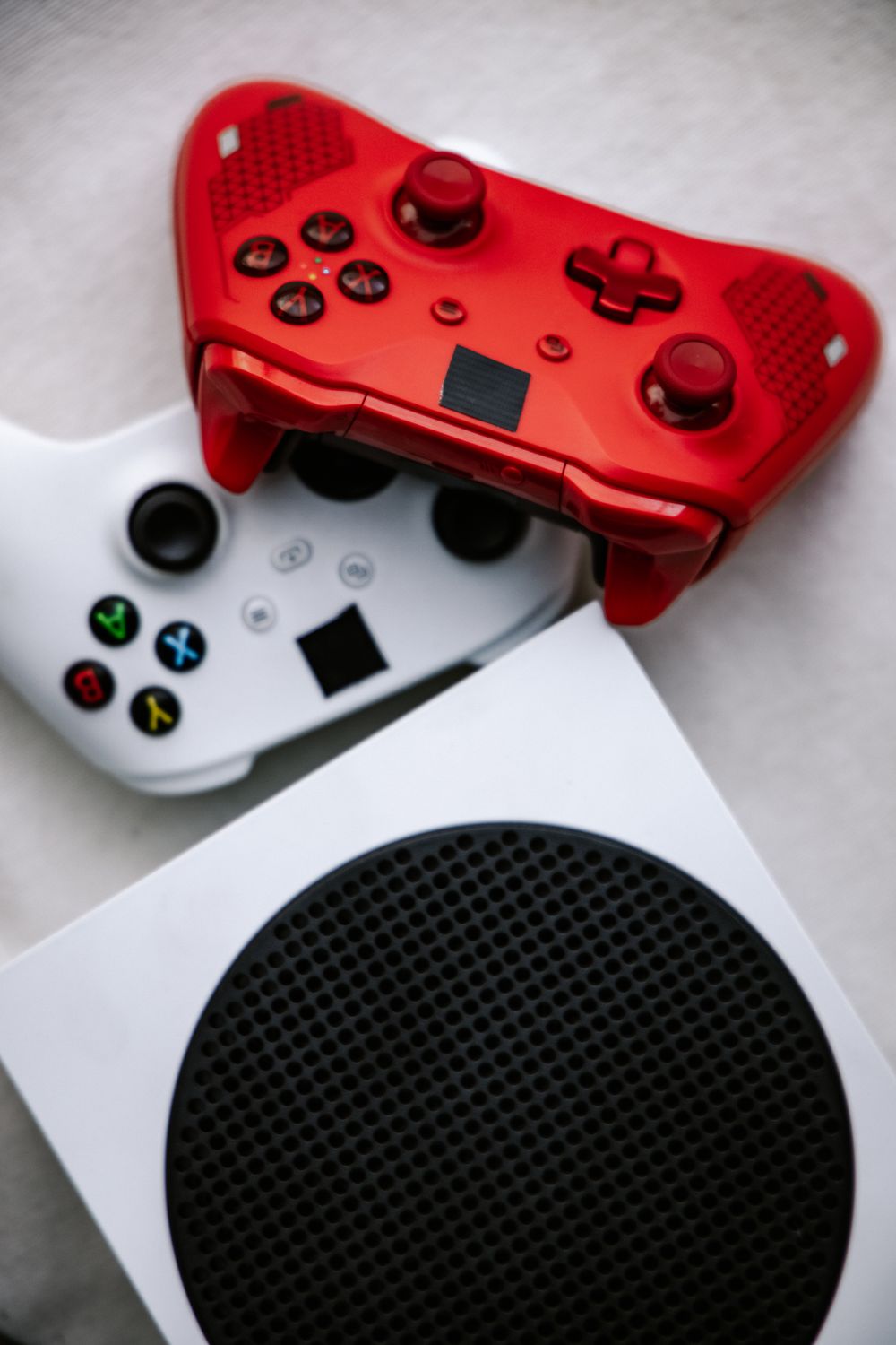 Video Game Console and Controllers in Close-up shot · Free Stock Photo