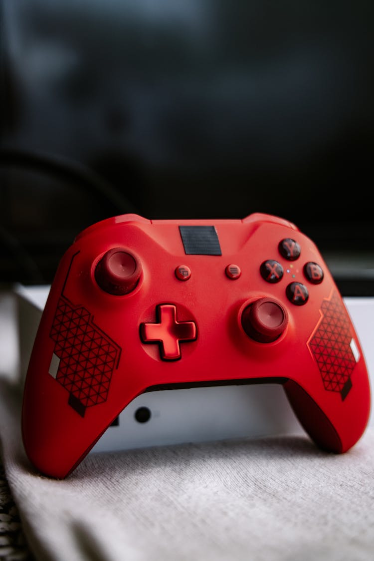 Red Xbox One Wireless Controller In Close Up Photography