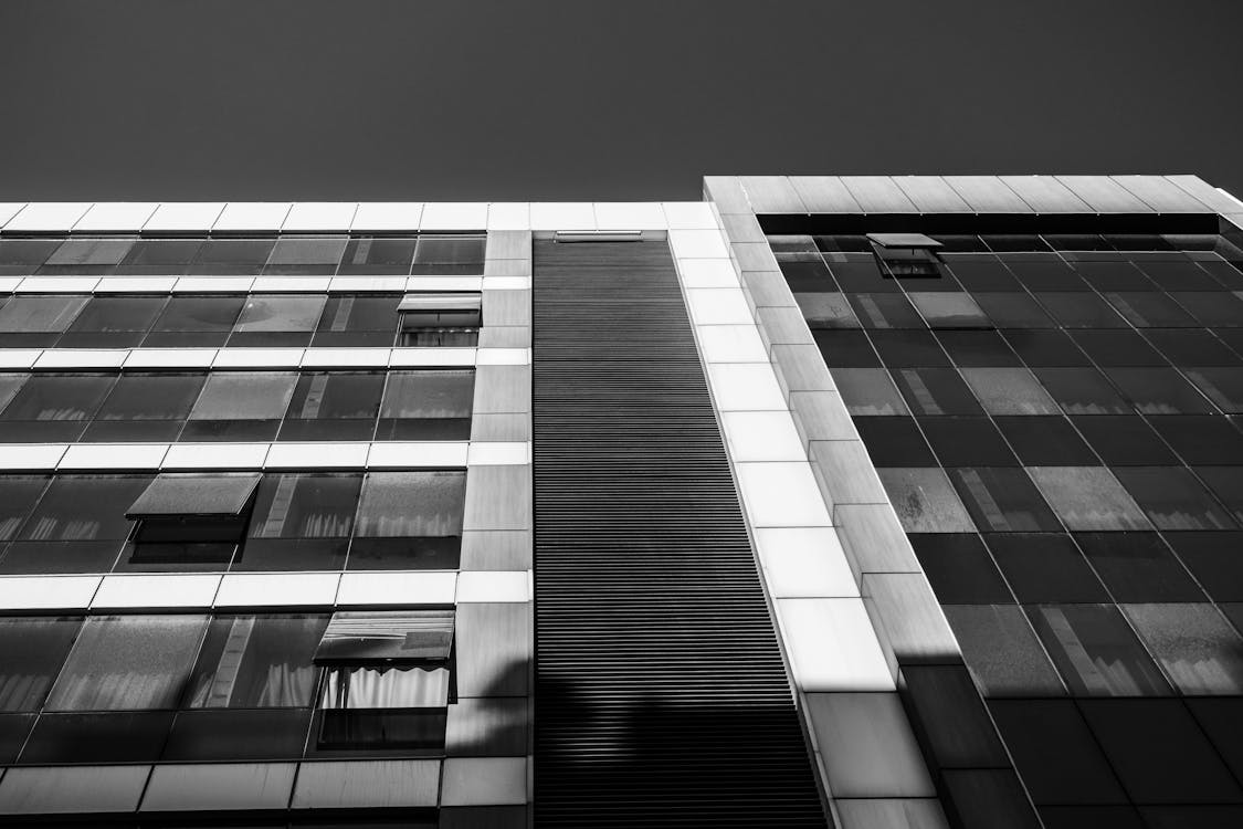 Grayscale Photo Of A High Rise Building Free Stock Photo grayscale-photo-of-a-high-rise-building-free-stock-photo
