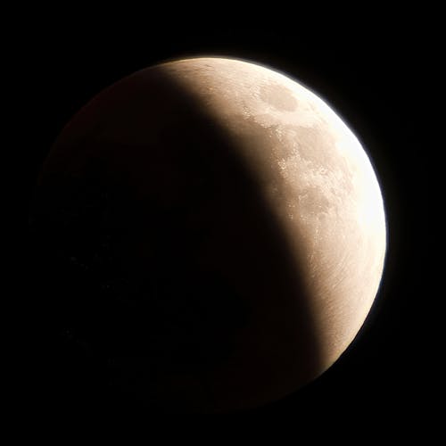 Close-Up Shot of a Half Moon