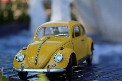 A Miniature Volkswagen Beetle in Close-up Shot