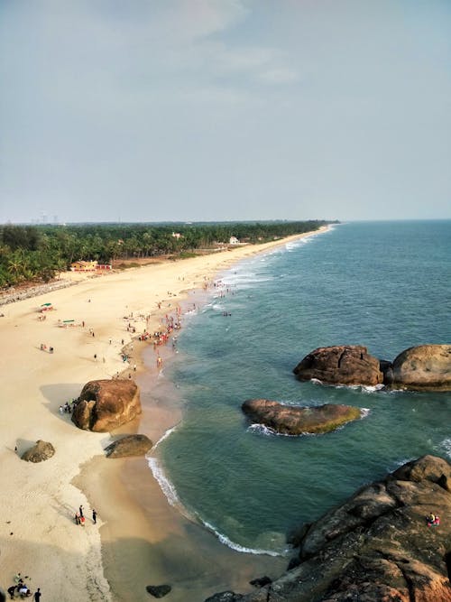 An Aerial Photography of People on the Beach