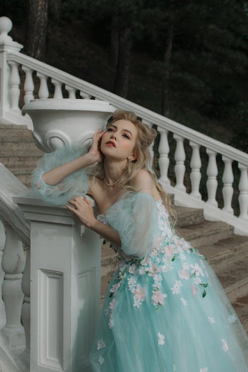 Free Woman in Princess Gown Daydreaming Stock Photo