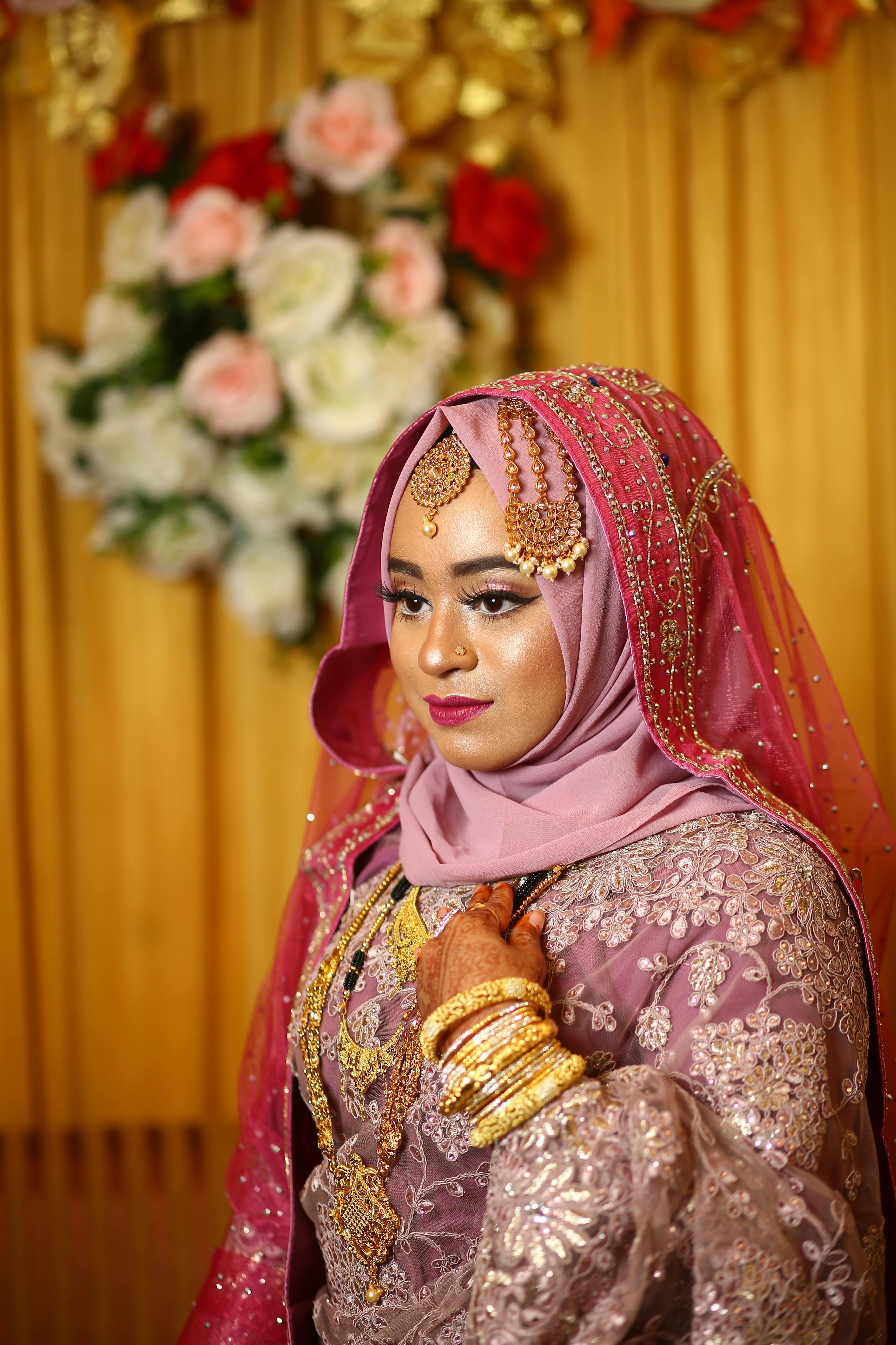 bride in pink traditional bridal wear