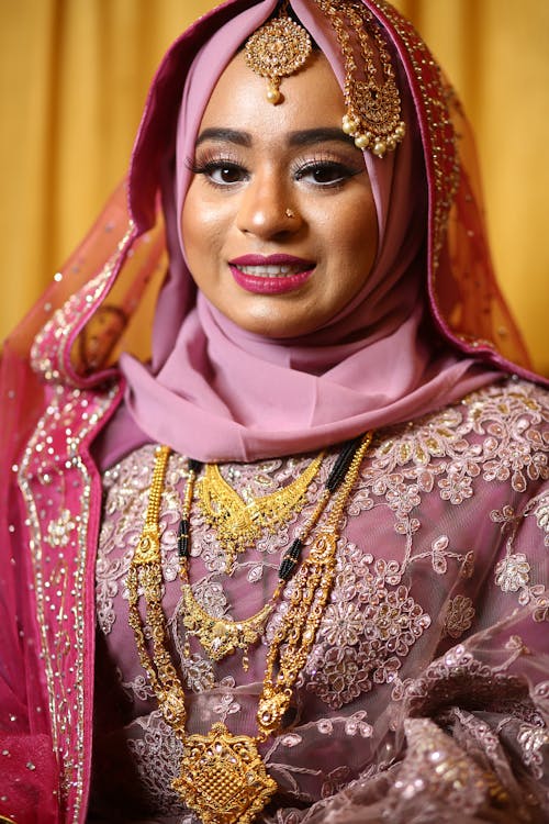 Smiling Woman in Pink Traditional Wear
