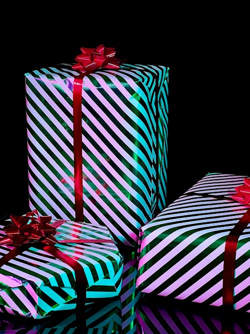 Free Christmas Presents on Black Background Stock Photo