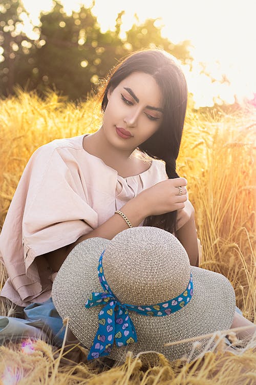 Free Woman Fixing her Hair Stock Photo