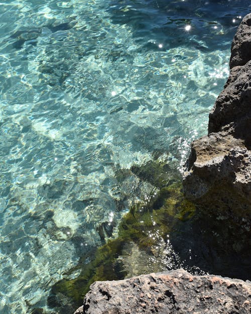 Foto profissional grátis de água limpa, formação rochosa, mar