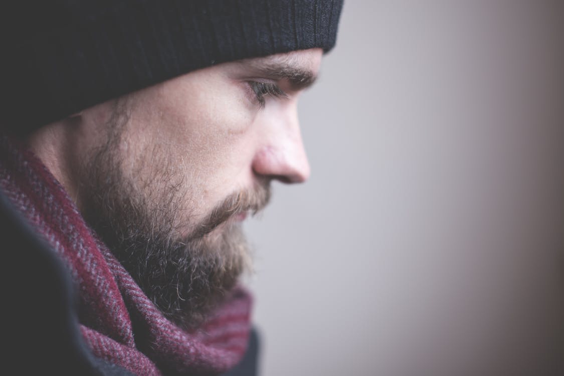 Free Man in Red Scarf and Black Nit Hat Stock Photo