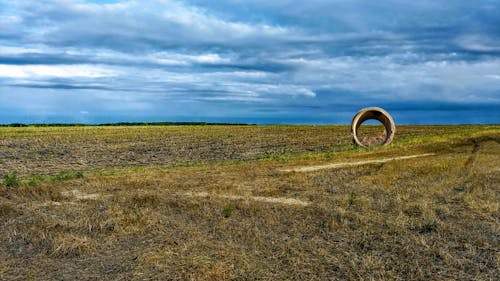 Gratis arkivbilde med åker, betong, himmel